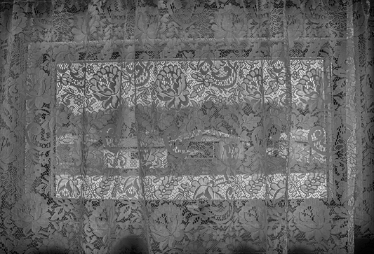 we had the same lace curtains by Madisyn Simington